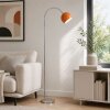 Brilliant lampadaire à arc Helen au style moderne, abat-jour demi-sphère orange